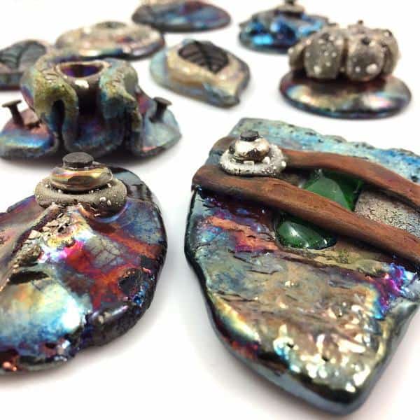 Ceramic Raku jewelry pieces created by Marianne Kasparian