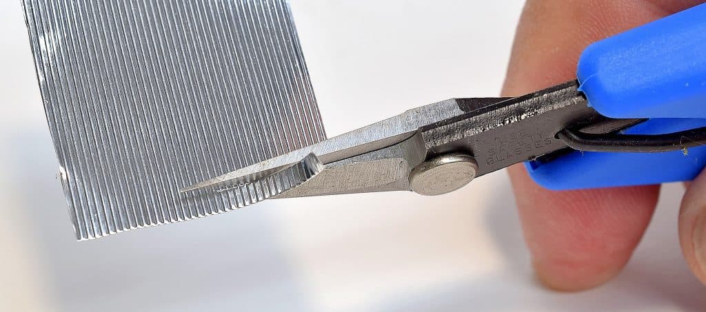 The Xuron® 9180ET easily cuts lightweight corrugated metal used in model construction.