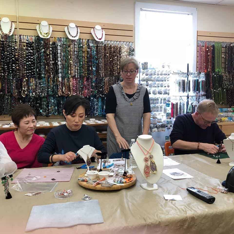 Mary Soucy teaching beading.