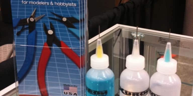 Xuron catalogs and bottles Xuron Corp. catalogs and liquid dispensing bottles